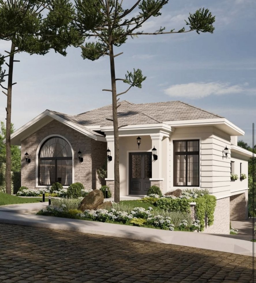 Stone and stucco home with arched window